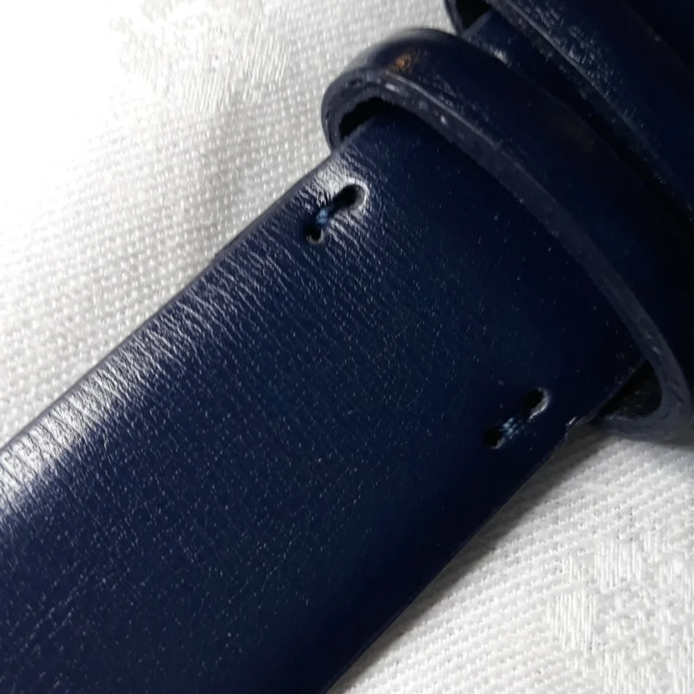 Calvin Klein dark blue leather belt. 34 inches long